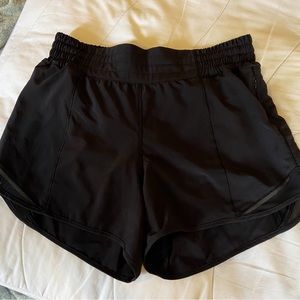 Lululemon Hotty hot shorts 4” inseam. Black. Size 6 Tall. EUC